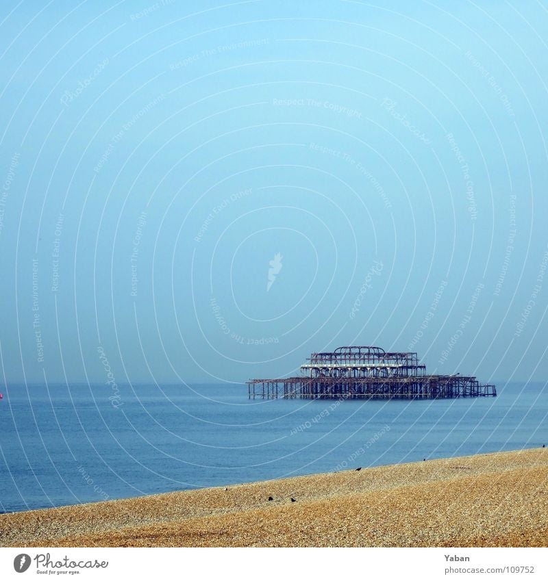 Old Brighton Pier England Great Britain Jetty Derelict Decompose Art nouveau Decline Ocean Lake Beach Transience Steel carrier abandoned Rust former glory