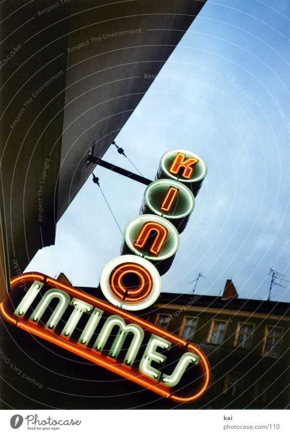 It's a movie. Cinema Neon sign Retro Historic Town Friedrichshain Old cinema intimate Sky Berlin Nostalgia Neon light Signs and labeling Lighting Intimacy