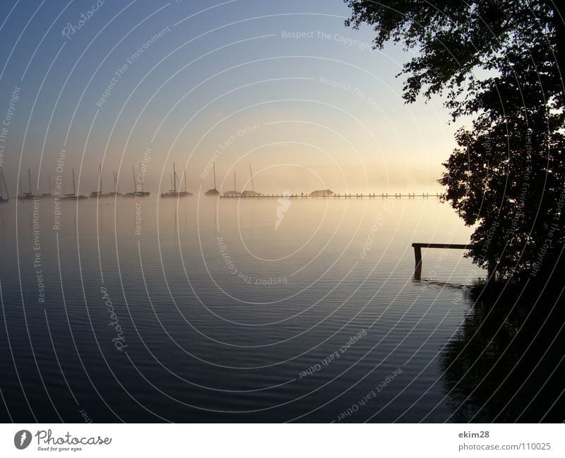 in the morning at 7 Sunrise Fog Lake Starnberg Sailboat Footbridge Summer Calm head of the lake