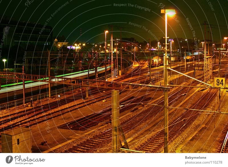 Basel at night Railroad tracks Long exposure Speed Transport Hissing Dark Depart Come Train station Movement motion Night Tracks sky big city Vacation & Travel