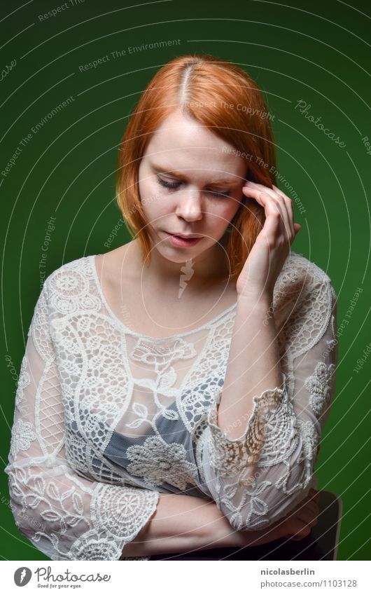 Portrait of beautiful redhead against green background Elegant Beautiful Senses Calm Blackboard Teacher Professional training Apprentice Internship