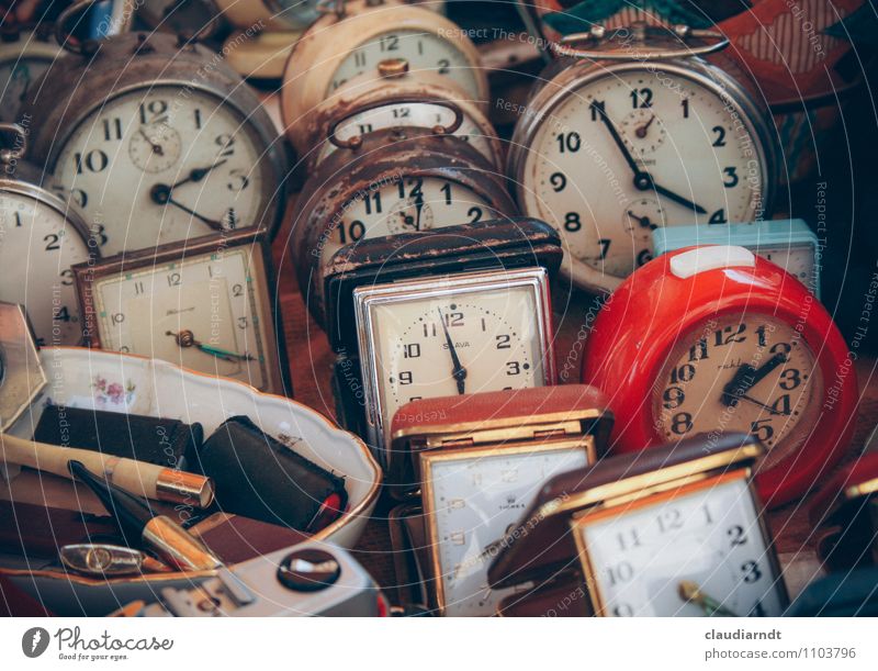 it's ticking... Clock Old Broken Retro Trashy Red Past Time Future Alarm clock Flea market Flea market stall Clock face Time zones Colour photo Exterior shot