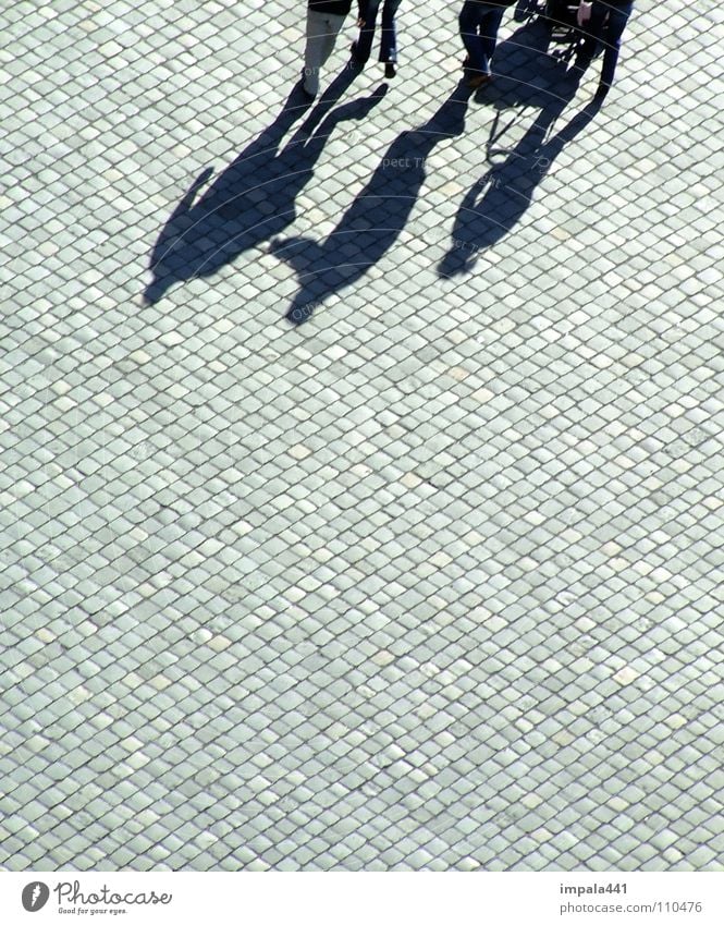 shadowy existence II Pedestrian Black Sidewalk Cobblestones To go for a walk Going Places Pedestrian precinct Dresden Historic Group Shadow Walking Couple Legs