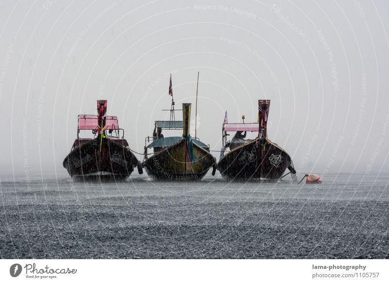 side by side Bad weather Rain Thunder and lightning Ocean Lake Koh Mook Thailand Asia Boating trip Fishing boat Longtail Longboat Attachment Colour photo