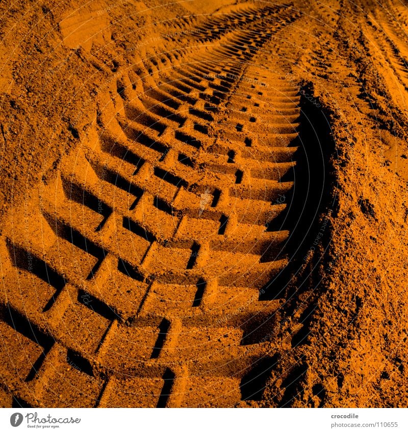 Traces in the sand Excavator Gravel plant Red Driving Heavy Silhouette Negative Dark Vanishing point Long exposure Sand Dirty Orange work Tracks Profile