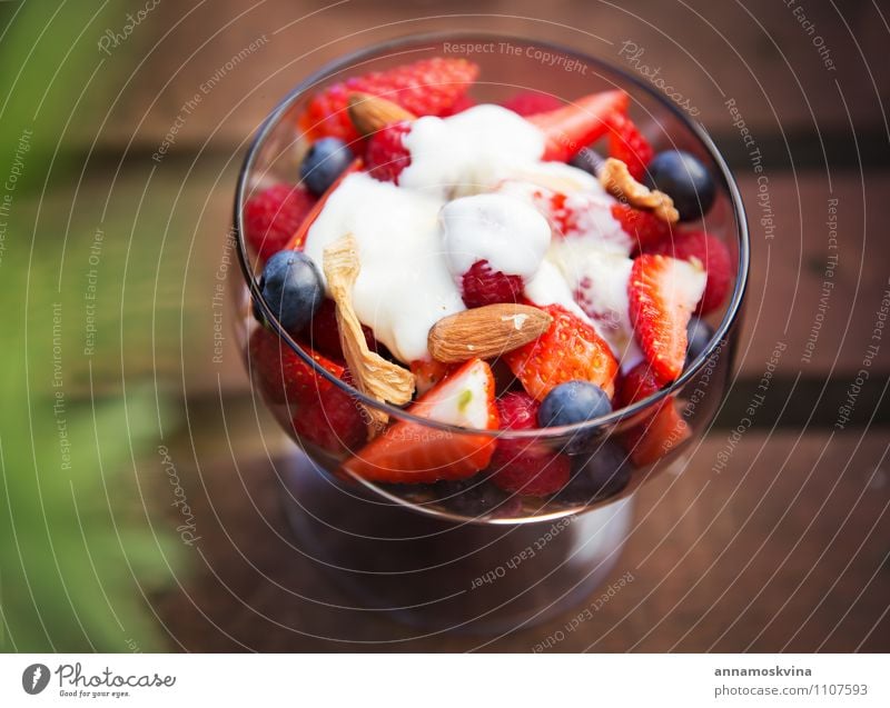 Fresh yogurt with fruits and muesli on breakfast Yoghurt Fruit Dessert Nutrition Eating Breakfast Diet Bowl Red White Cereal healthy Salad food Berries cream