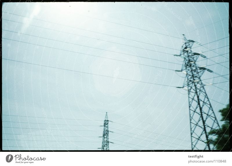 outside Cable Electricity Reflection Sky Highway Motion blur Grainy Light Sunlight Beautiful weather Industry wire Blue out of the window power supply Street