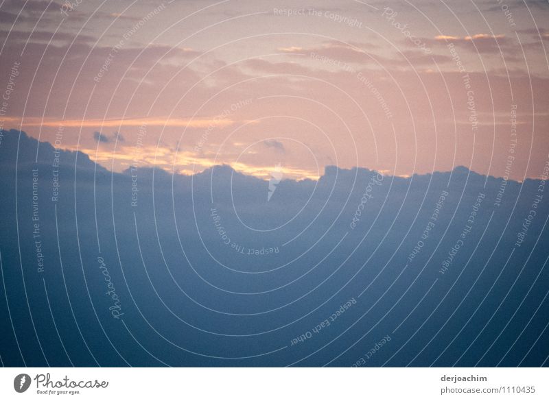 A big band of clouds at sunrise on Pacific. Joy Calm Leisure and hobbies Trip Summer Nature Elements Clouds Sunrise Sunset Beautiful weather Beach Ocean