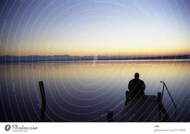 Silence on the lake at sunset Lake Sunset Light Footbridge Man Calm Serene Contentment Meditation Relaxation Break Breathe Air Fresh Cold Loneliness