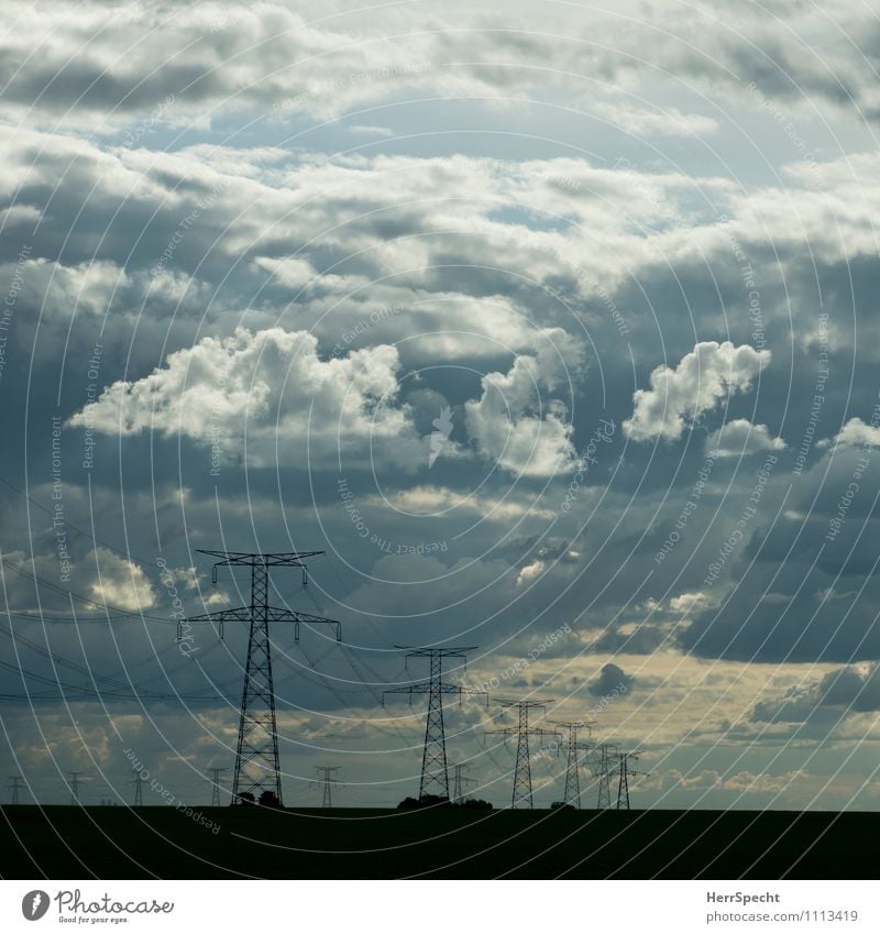 POWER Energy industry Electricity pylon High voltage power line Landscape Sky Clouds Esthetic Threat Gray Clouds in the sky Cloud formation Dusk Perspective Row