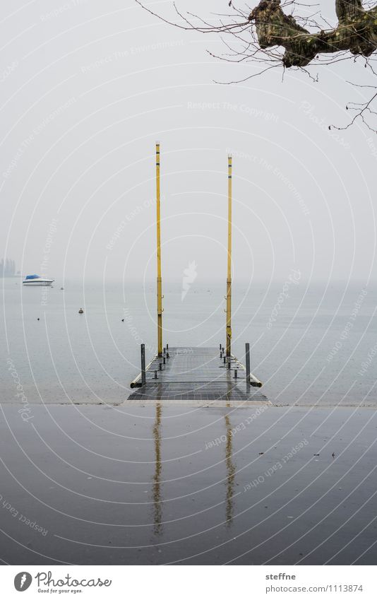 passage Coast Lakeside Navigation Boating trip Yacht Harbour Gloomy Jetty Footbridge Rain Damp Wet Reflection Colour photo Subdued colour Exterior shot Deserted