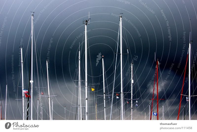 Sailboat masts before storm front Gale Heavy Sailing Watercraft Ocean Safety Fear Fascinating Esthetic Tense Sky Aquatics emerging Thunder and lightning