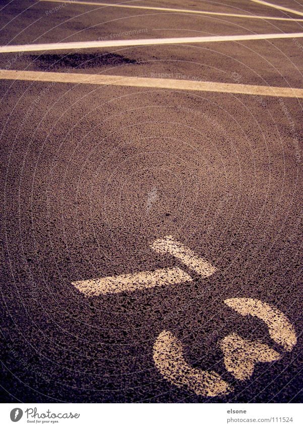 ::73:: Digits and numbers White Lettering Zigzag Typography Parking lot Concrete Gray Black Traffic infrastructure Characters Line Perspective Sign semiotics