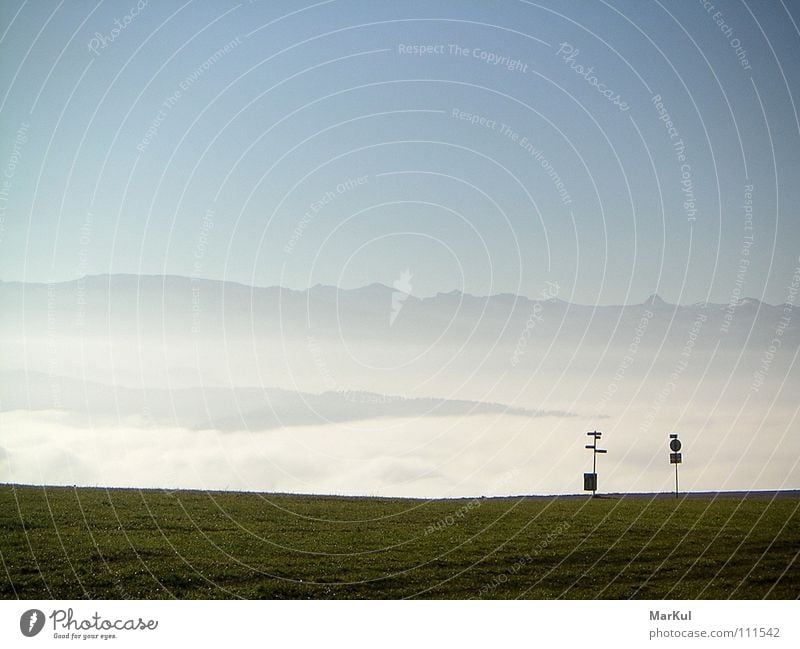 Plateau with view to the mountains High plain Mountain range Deserted Horizon Infinity Above the clouds Autumn Street sign Bilick above cloud cover height