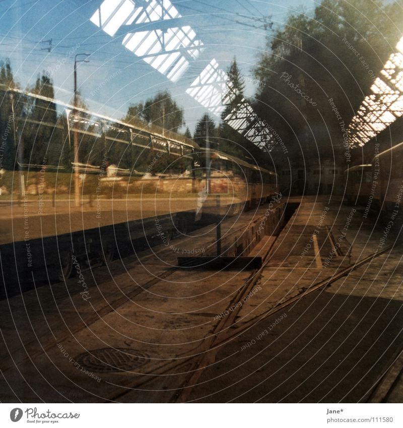 ...I'm still searching. Brown Green Gray Concrete Light Reflection Pane Window Diagonal Black Tree Sky Autumn Railroad tracks Tram Dresden Graphic Square