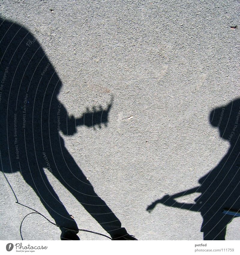 shadow combo Vienna Austria Busker Culture Leisure and hobbies Dream Prayer Make music Playing Black Gray Concert Music Shadow Street Human being Life Artist