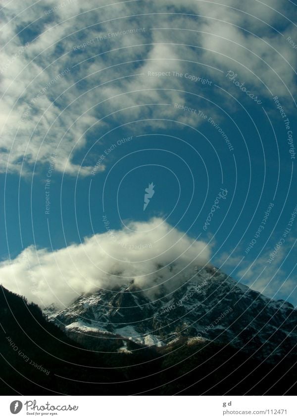 About the mountain Clouds Action White Mountain Blue Stone Rock Dynamics Movement Sky Snow