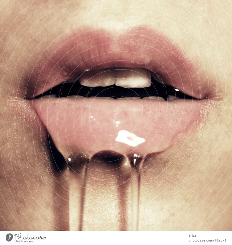 A mouth with lips from which a transparent liquid like spit, drool or water runs Mouth Slaver Saliva Water Lascivious Lips Woman sensual flowing Fluid DNA