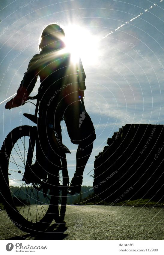 A SPARK OF JOY Mountain bike Autumn Sunbeam Dark Vacation & Travel In transit Tracks Bicycle Heavenly Funsport Silhouette biking Contrast Street Blue sky Action