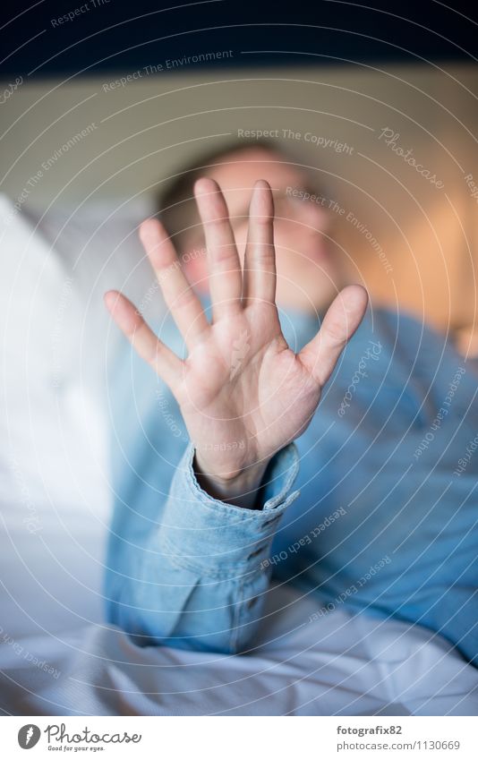 Stop. Masculine Adults Hand Fingers 1 Human being 30 - 45 years Blue denim shirt Gesture Indicate Bedclothes Relaxation Colour photo Subdued colour