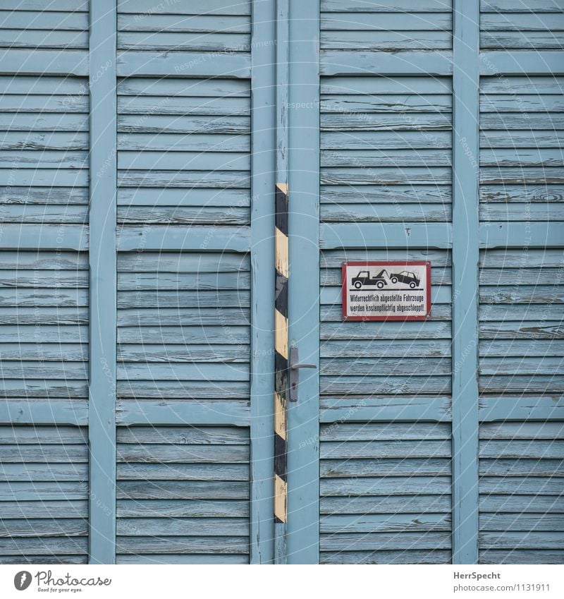 A gate (who parks here) Gate Manmade structures Building Door Road traffic Motoring Road sign Wood Characters Signage Warning sign Old Esthetic Blue Clearway