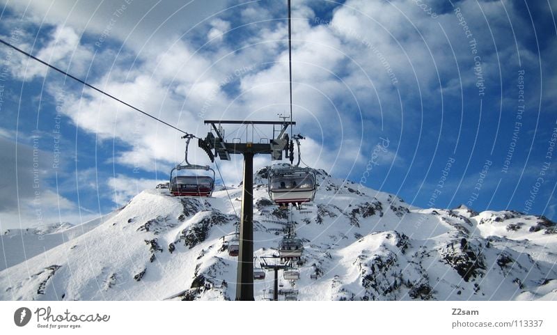 ascent Austria Chair lift Peak White Winter Snowscape Clouds Ski resort November Winter sports Mountain Alps Upward Above Tall Sky Ski lift Snowcapped peak