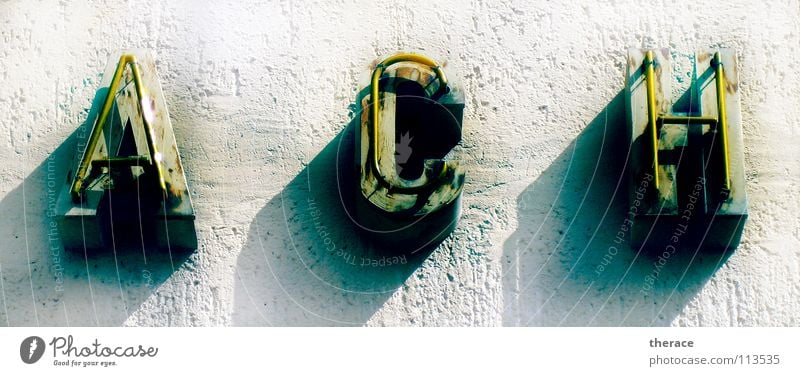 Under each roof a Colour photo Detail Light Shadow Sunlight Lamp Königsstein Saxony Europe Industrial plant Factory Old Dark Yellow Concern Grief Distress