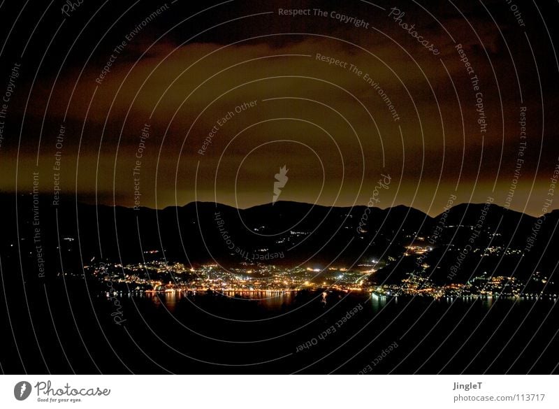 nocturnal thoughts Night Dark Threat Gale Clouds Aurora Borealis Dramatic Sky Lake Bright Reflection Hill Mountain range Italy Piedmont Wind Weather Firmament