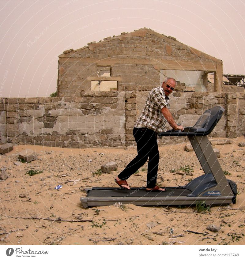 Home Trainer Moving pavement Jogging Ruin House (Residential Structure) Dry Man Sunglasses Destruction Practice Derelict Desert Dangerous Walking Sand Fitness