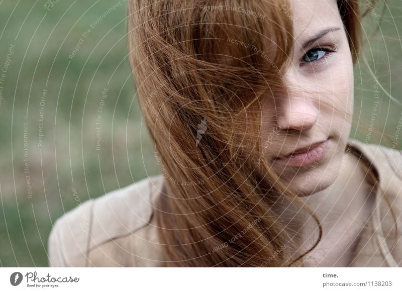 . Feminine Young woman Youth (Young adults) 1 Human being Jacket Red-haired Long-haired Observe Looking Wait Beautiful Skeptical Colour photo