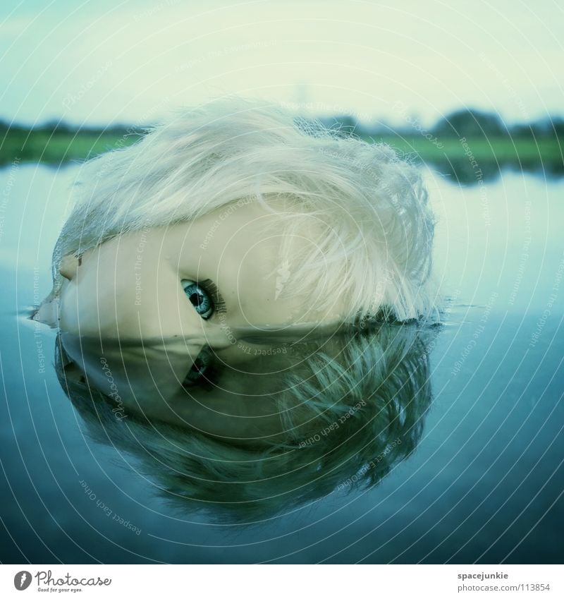 In the water (2) Toys Threat Alarming Blonde Chucky Creepy Horror film Evil Sweet Cute Whimsical Lake Ocean Wet Joy Doll Eyes Blue Fear Wild animal