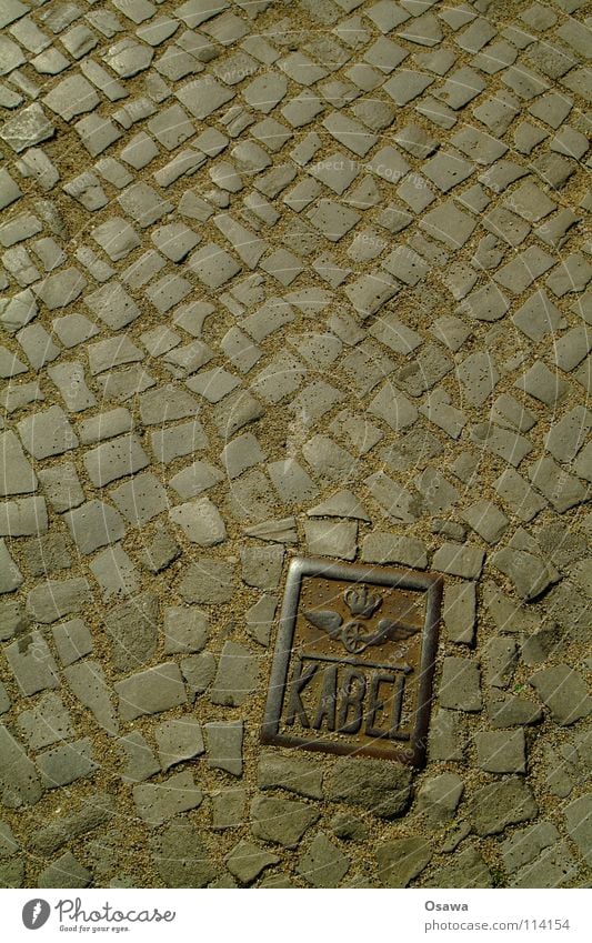 Heidi Iron Cast iron Cobblestones Granite Floor covering Places Friedrichshain Traffic infrastructure Cable Signs and labeling Wing Rust Stone Street Ostkreuz