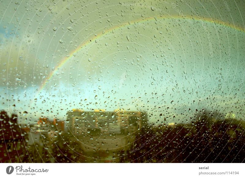 rain bow drops Rain Window Window pane Rainbow Dark Exceptional Clouds Town Nature Sky Beautiful Transience Glass Colour raindrops supernatural colours