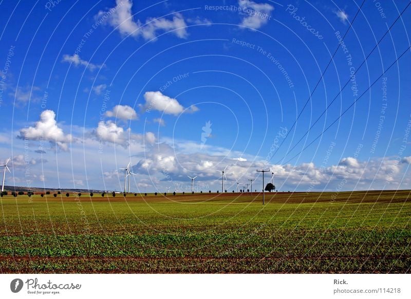 Clean Power 2. Green Wind energy plant White Technology Nature Clouds Sky Electricity Autumn Energy industry Blue Cable Electricity pylon Colour Perspective