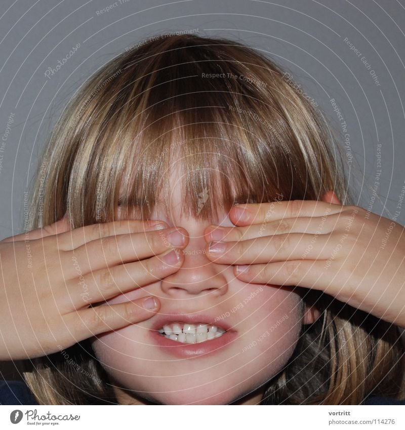 eyes to and through Portrait photograph Child Girl Lips Hand Fingers Blind Dark Playing Small Kindergarten Concealed Joy Hair and hairstyles Looking Fear Nose