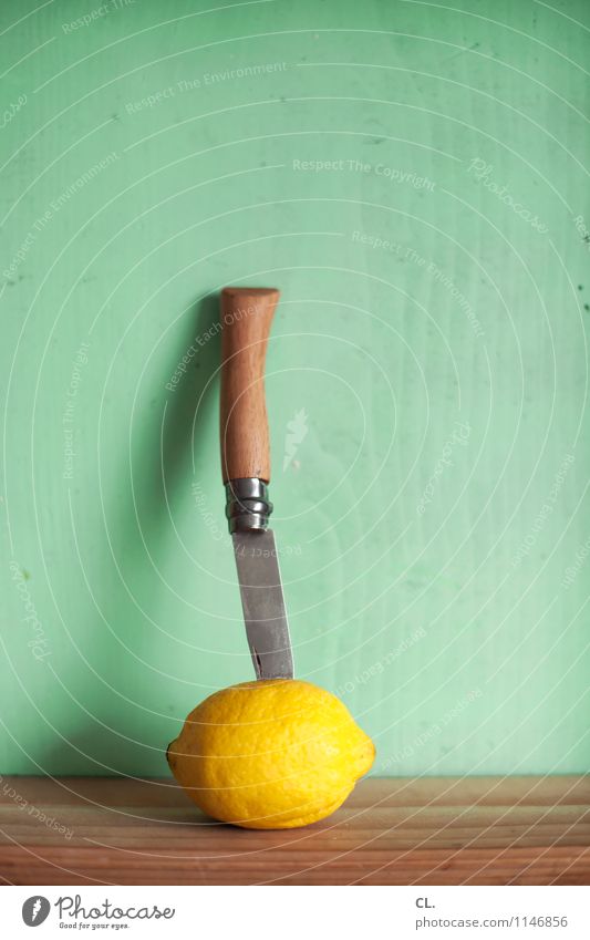 knife in lemon Food Fruit Lemon Nutrition Eating Knives Healthy Eating Wood Fresh Yellow Colour photo Interior shot Deserted Day