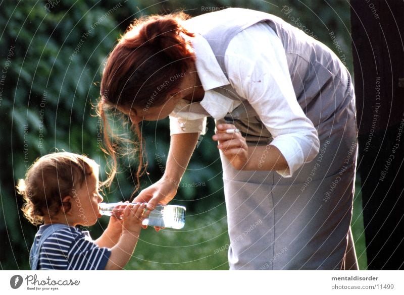 helping hand Mother Woman Son Love Boy (child) Bottle Water in the country