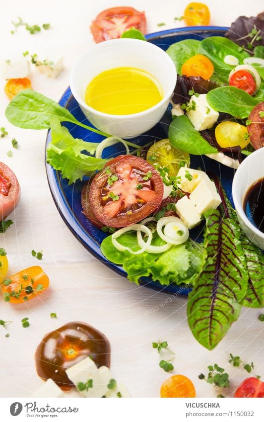 Summer salad with tomatoes and feta cheese Food Dairy Products Vegetable Lettuce Salad Herbs and spices Cooking oil Nutrition Lunch Organic produce