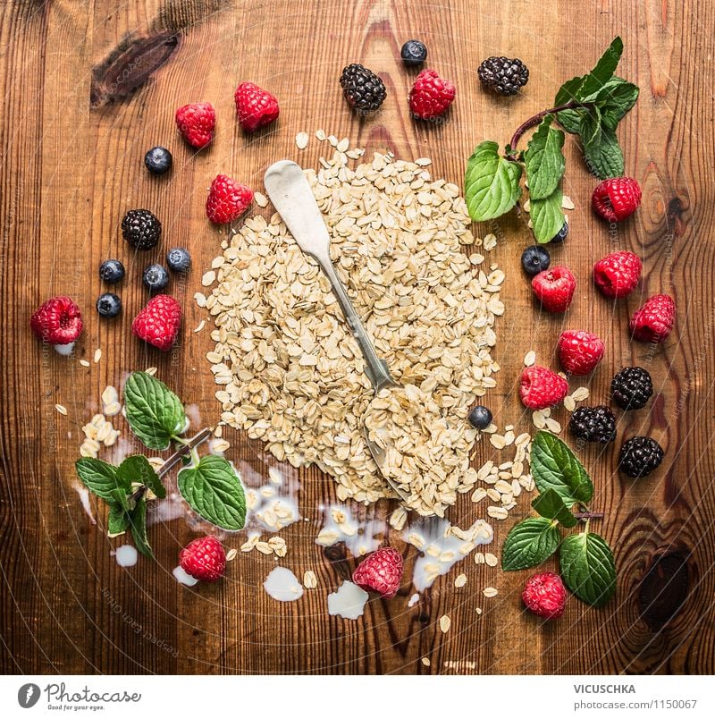 Oat flakes with berries and spoon Food Dairy Products Fruit Grain Dessert Nutrition Breakfast Organic produce Vegetarian diet Diet Milk Spoon Style Design