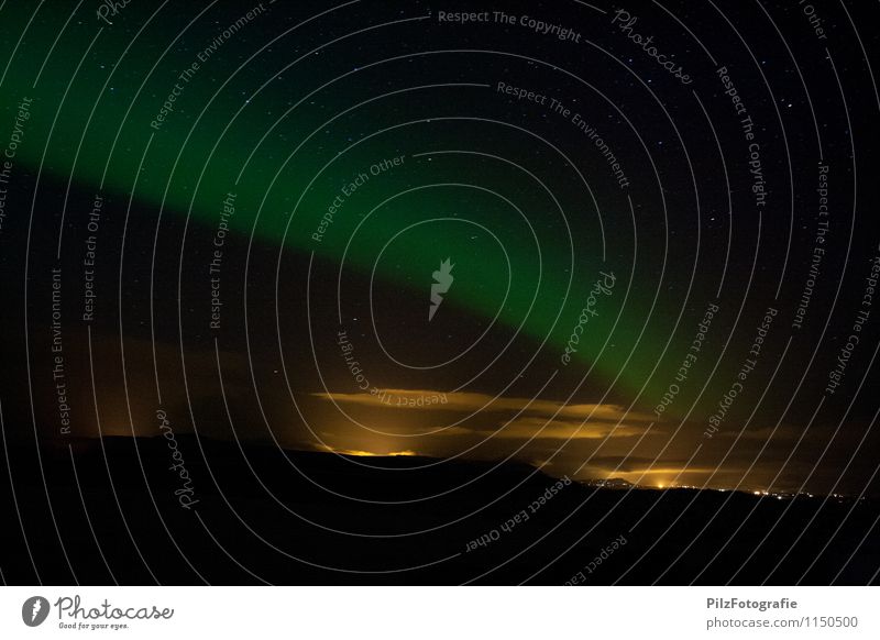 Aurora about Selfoss Sky Clouds Night sky Aurora Borealis Town Outskirts Exceptional Green Orange City light aurora polaris Hill House (Residential Structure)