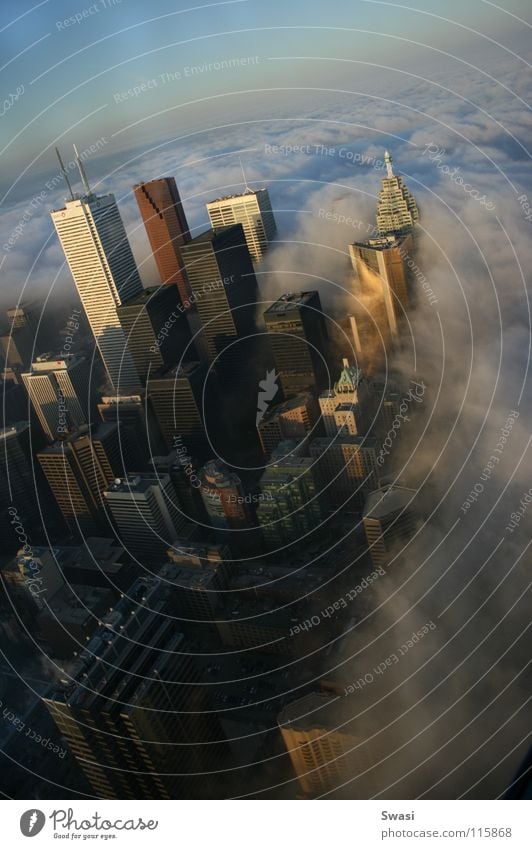 Skyline of Toronto CN Tower High-rise Clouds Fog Town Canada