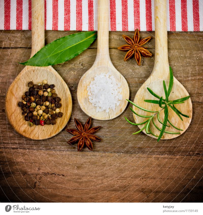 spices Herbs and spices Pepper Wooden spoon Peppercorn Rosemary Cooking sea salt Star aniseed Kitchen Ingredients Country house Table Wooden table Near Close-up