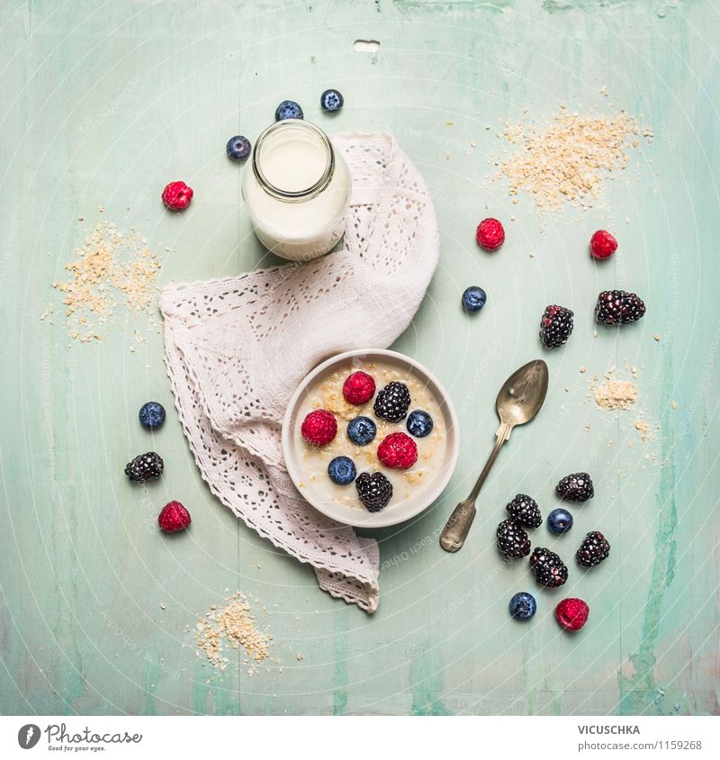 Breakfast with oat bran, milk and berries Food Dairy Products Fruit Grain Nutrition Organic produce Vegetarian diet Diet Beverage Milk Crockery Plate Bowl