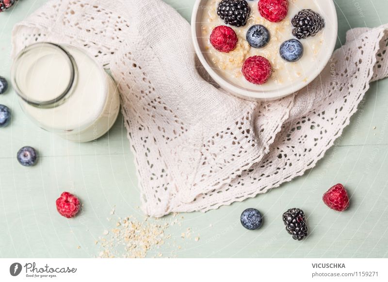 Oat porridge with milk and berries Food Dairy Products Fruit Grain Nutrition Breakfast Organic produce Vegetarian diet Diet Beverage Milk Bowl Life Summer