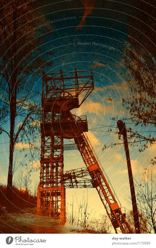 Stable in water Mine Mine tower Reflection Leaf Red Colouring Exposure Green Clouds Steel Aspire Lantern Puddle Industry Water Sky Blue Branch trees