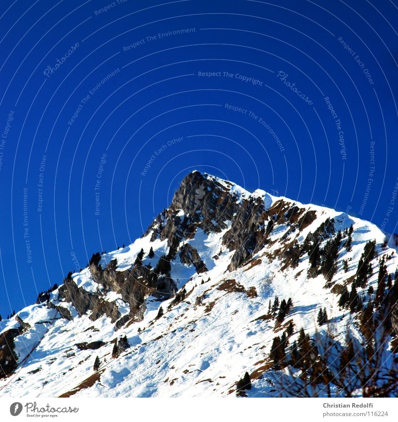 summit Peak Stone Lake Snow melt Spruce Peak cross Winter Mountain Alps Rock Sky Blue timber line