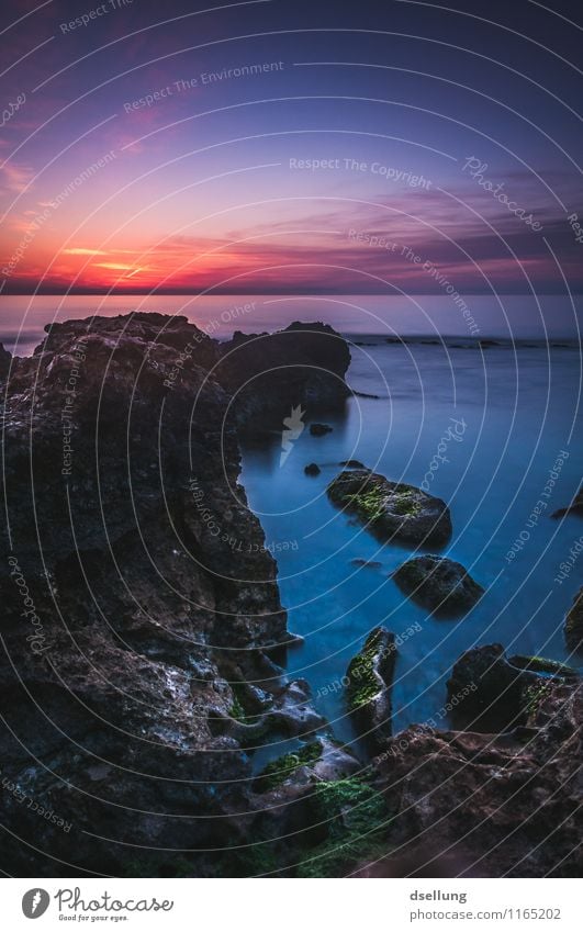 Rock formations at sunset by the sea End of the day relaxing wide Shadow Twilight Sun Evening Sunset Clouds Panorama (View) Beautiful weather Sunlight Idyll