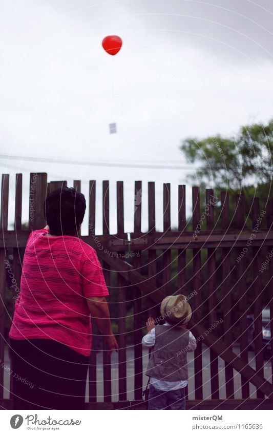 after them. Joy Esthetic Balloon Pulling back Fence Wedding Grating Past Grandmother Grandchildren Colour photo Subdued colour Exterior shot Close-up