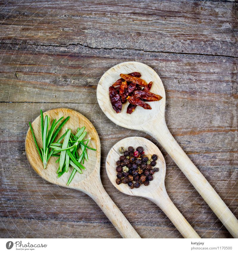 spices Pepper Peppercorn Herbs and spices Cooking Kitchen Ingredients Wooden spoon Chili Dried Rosemary Nutmeg Table Wooden table Close-up