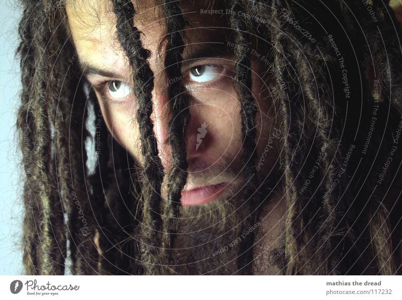 MUST Dreadlocks Felt Long Dark Upper body Upper arm Vessel Man Masculine Strong Threat Shoulder Concealed Nerviness Light Visual spectacle Shadow play Hand